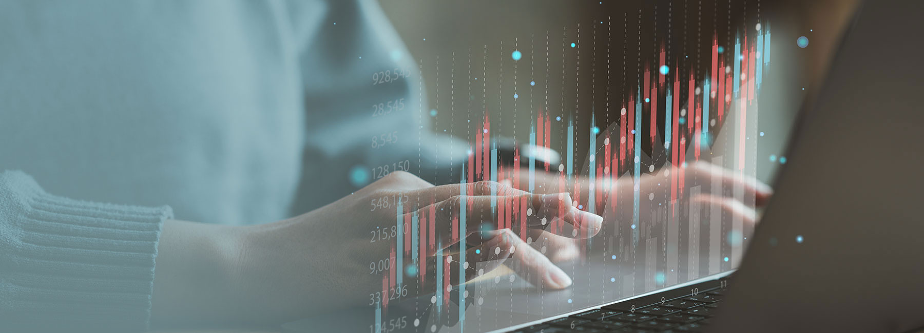 man types on keyboard, with overlay of charts appearing onscreen, Asset Management | DXC Technology