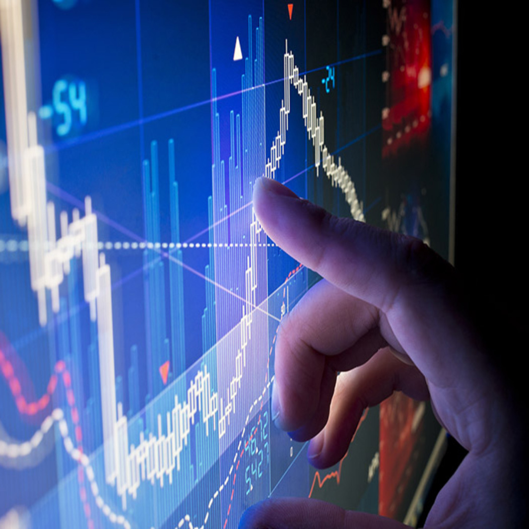 Finger financial graph data on digital touch-screen, Banking Software | DXC Technology Software